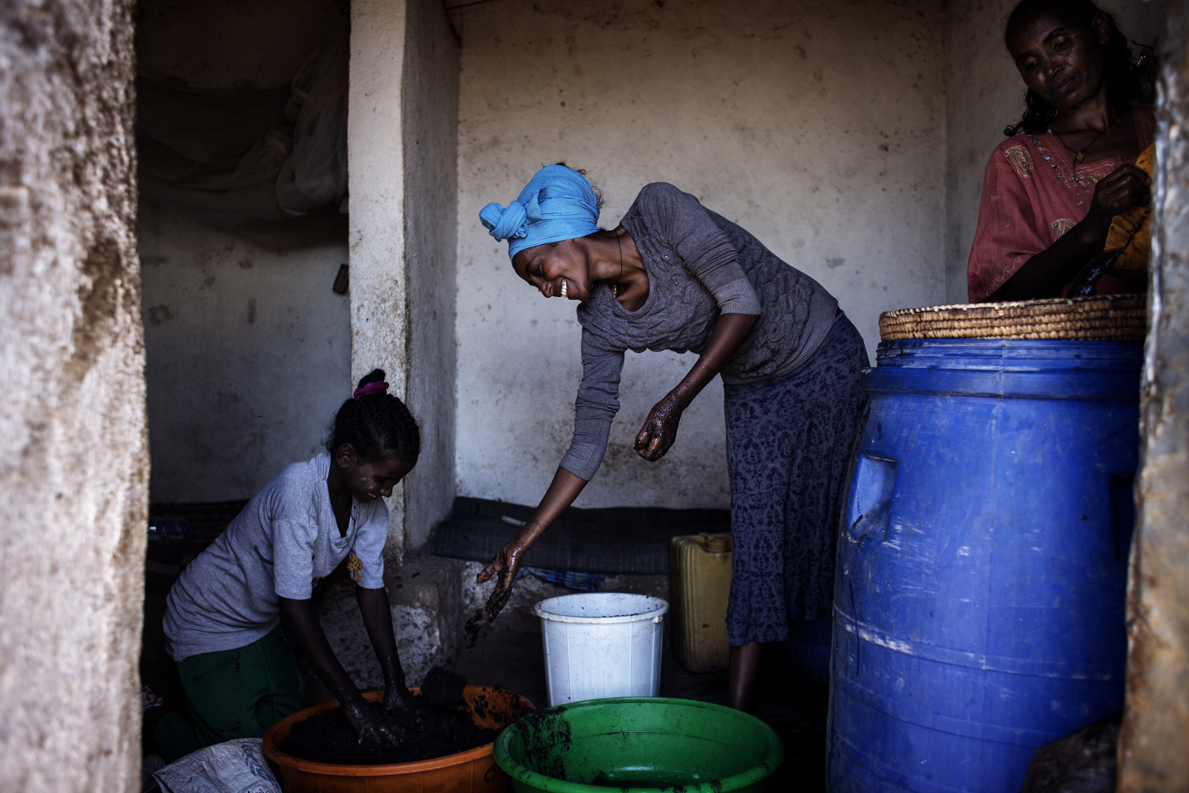 Refugees making beer in Adi Harush refugee camp, Ethiopia